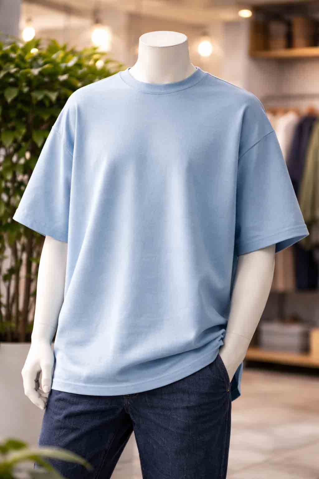 Close-up van oversized fit T-shirt met dropped shoulders en ruim silhouet